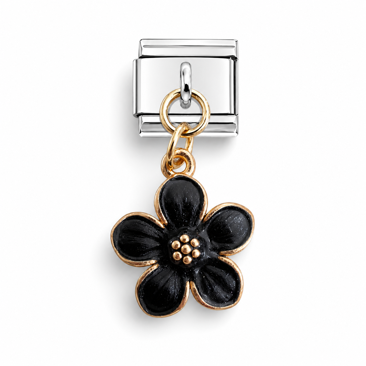 A silver-toned Italian charm link featuring a dangling five-petal flower charm with black enamel and gold-toned metal borders.