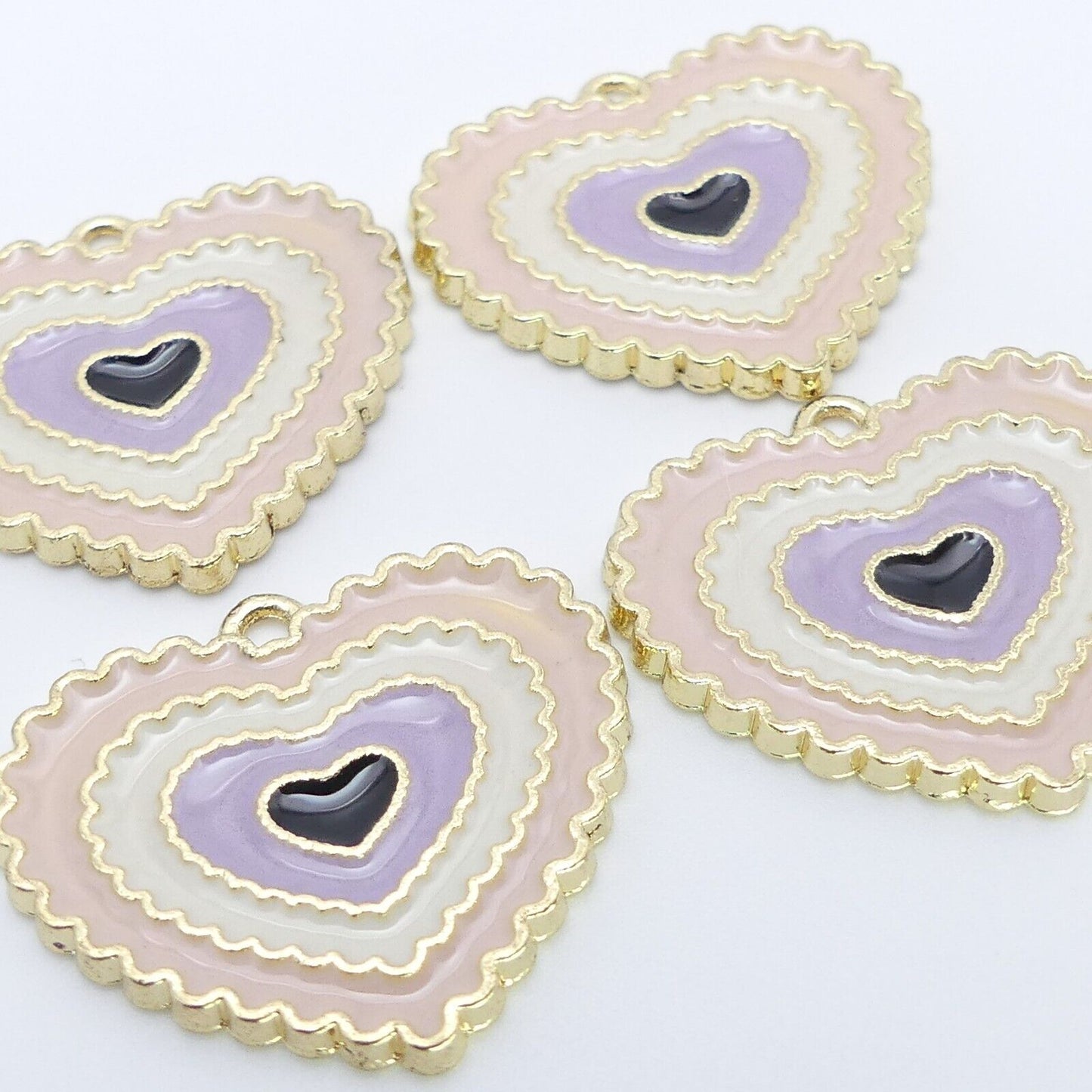 4 Pink And Lilac Enamel Heart Charms