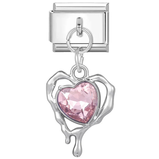 Heart dangle charm with pink heart-cut gemstone in silver-tone frame, for modular bracelets.