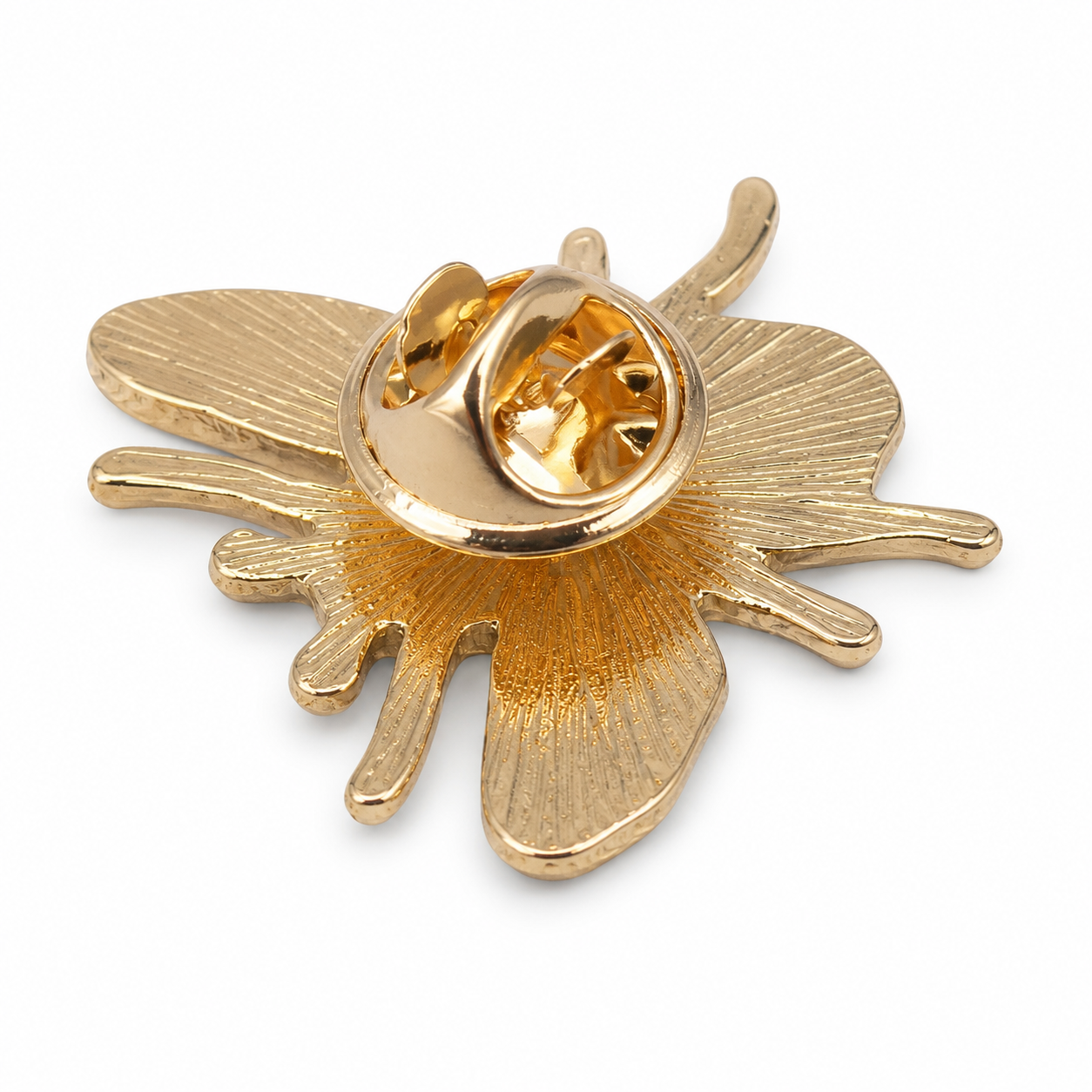Bee enamel pin badge back, gold-tone clasp and pin needle, open spiral