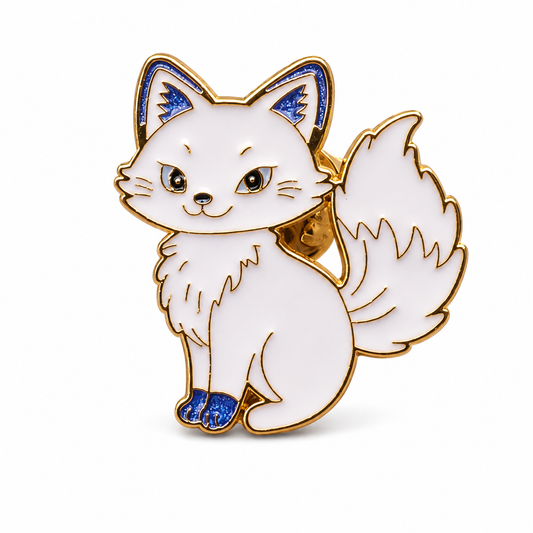 White enamel fox pin badge with gold border and blue glitter accents, standing