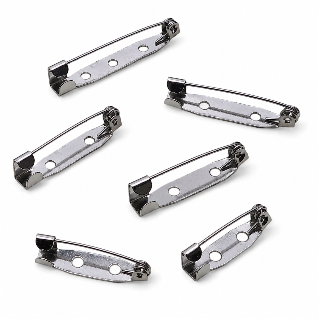 Silver brooch pin backs, five curved hinge clasps with round holes