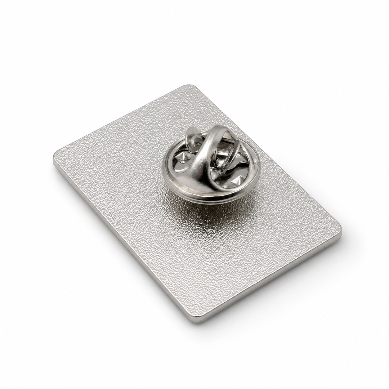 Silver enamel pin badge back with locking clasp on a square metal plate