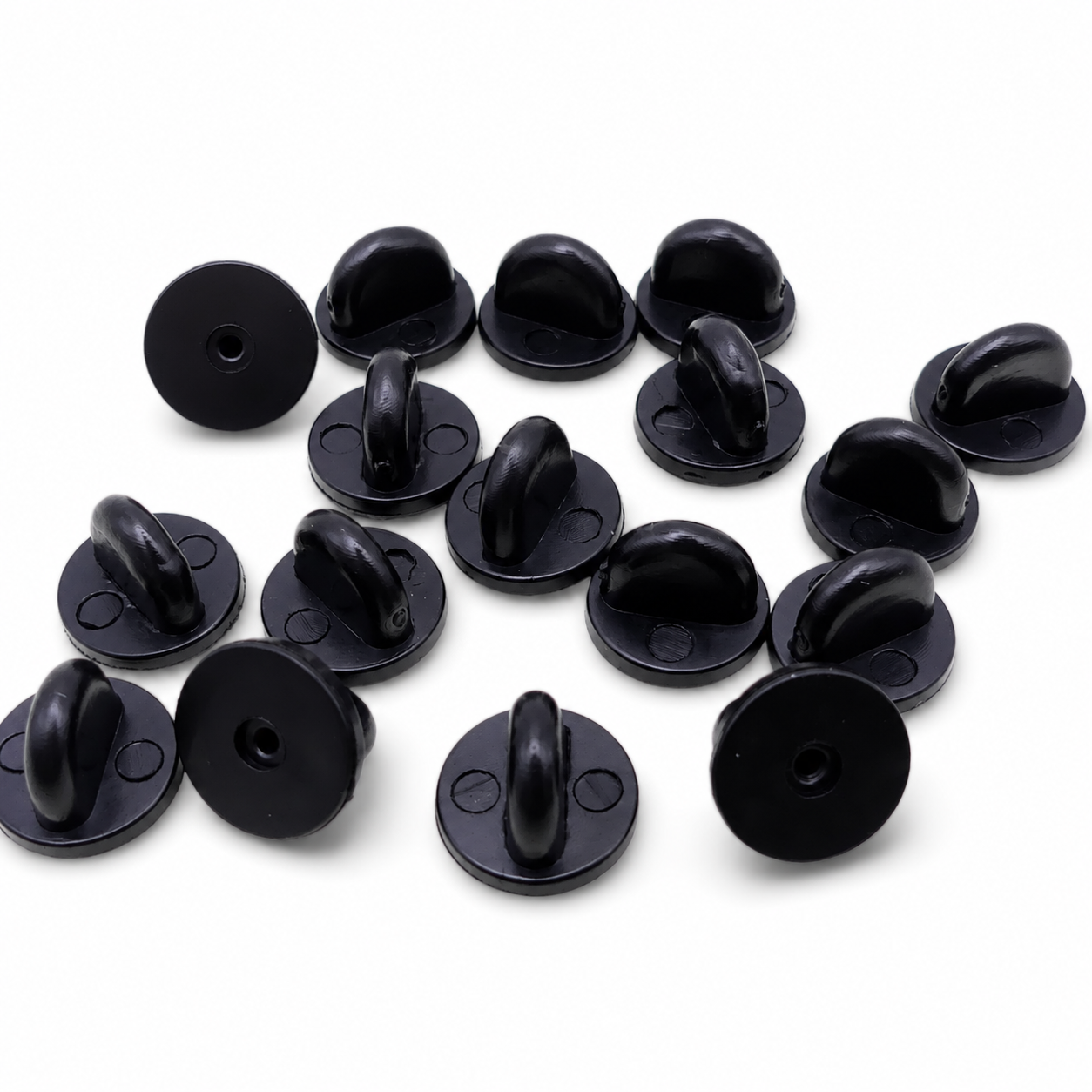 Black rubber pin backs with pin-post openings, replacement keepers for enamel badges