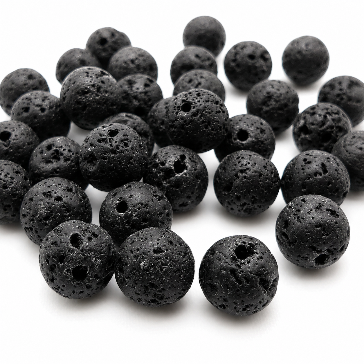 Black round lava stone beads bundle, rough volcanic texture and drilled center holes