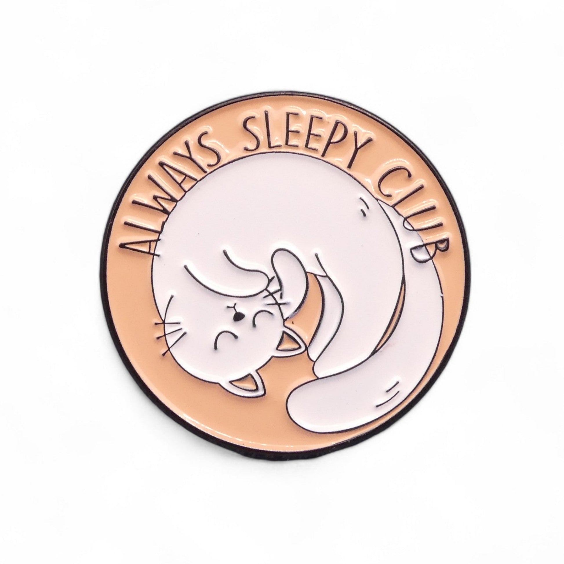 Enamel pin badge front with sleeping cat illustration and 'ALWAYS SLEEPY CLUB' text