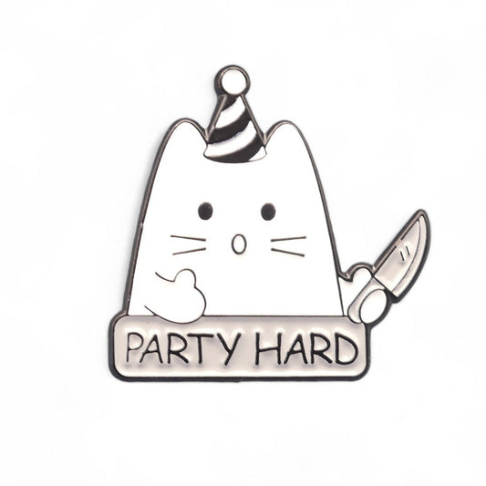white cat with party hat with the text party hard enamel pin badge.