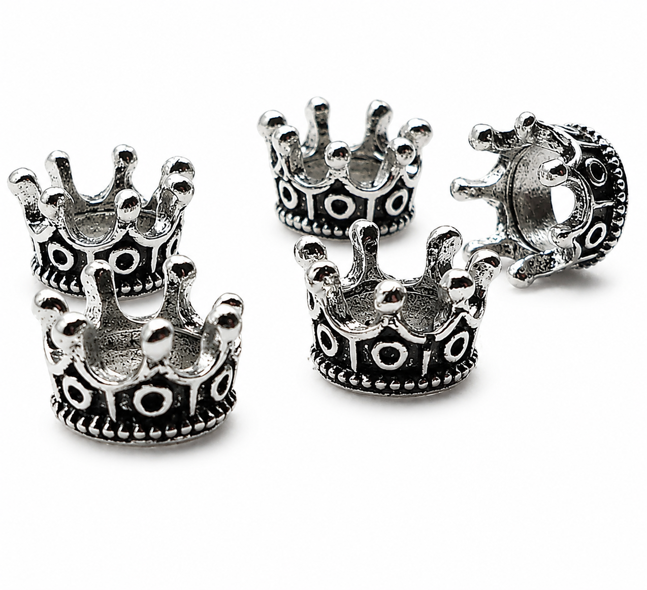 Five antique silver crown spacer beads with scalloped edges and dot-and-dot pattern