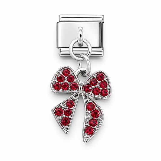 Red crystal bow charm with silver loop connector, dangling from clasp