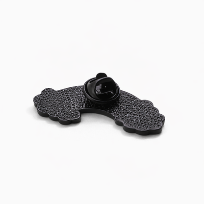 Black textured phone stand on a white background