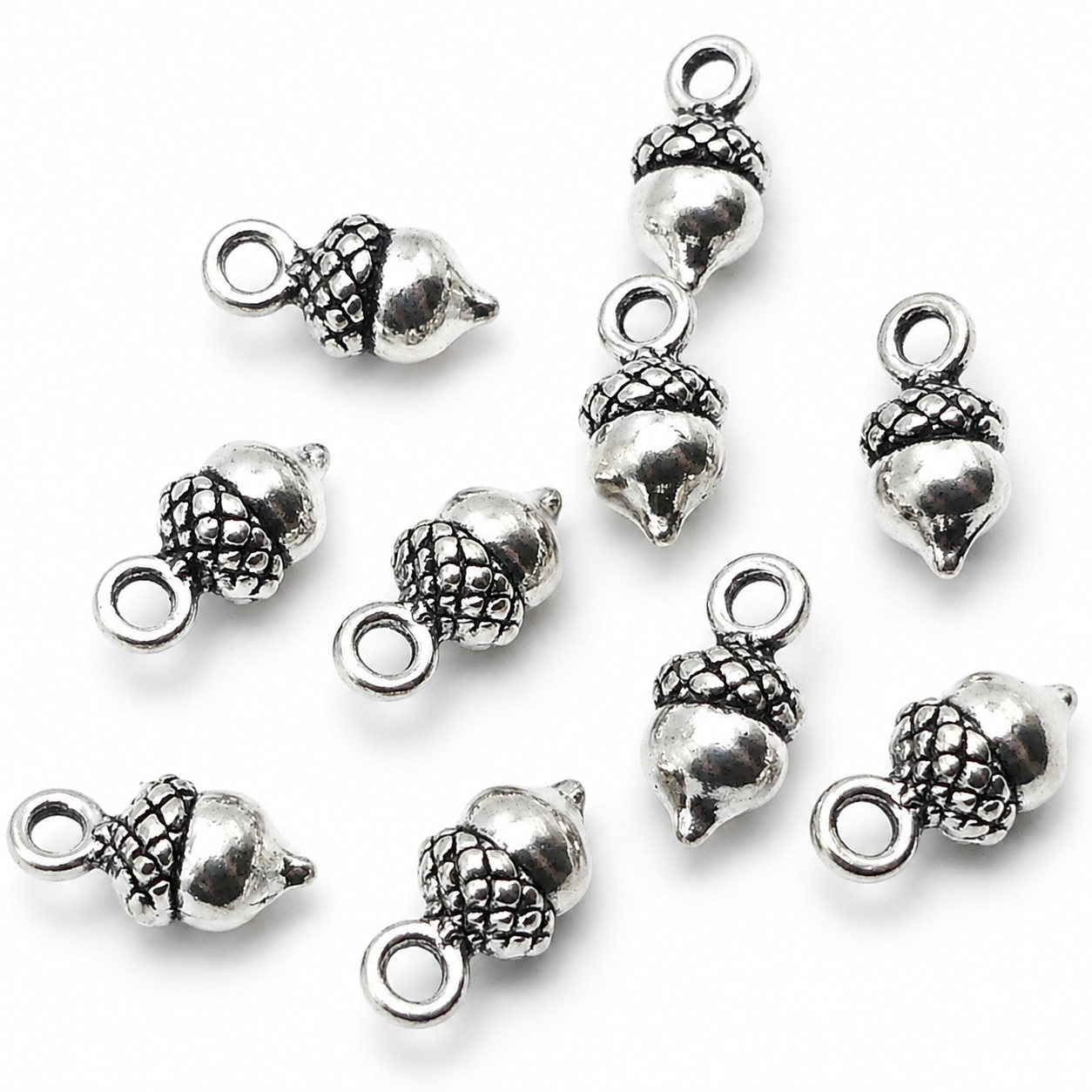 Tibetan silver acorn charm set, 3D metal acorns with loop tops, mixed angles