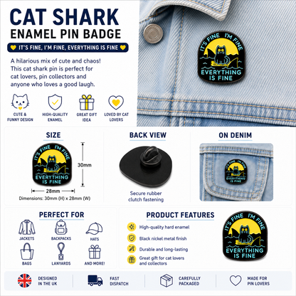 Enamel cat-shark pin on light blue denim near a buttoned pocket