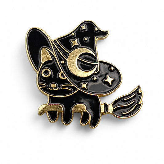 Black cat witch enamel pin badge with gold-tone moon, star, and wing accents
