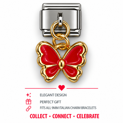 Gold butterfly charm with red enamel wings and hanging chain ring