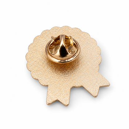 Gold-tone enamel pin rosette with butterfly clutch back and scalloped ribbon edges