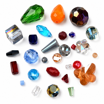 Assorted glass beads in mixed shapes and colors, faceted drop and jewel styles