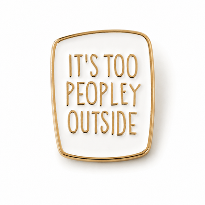 Enamel pin badge, white square front with gold border and “IT’S TOO PEOPLEY OUTSIDE” text.