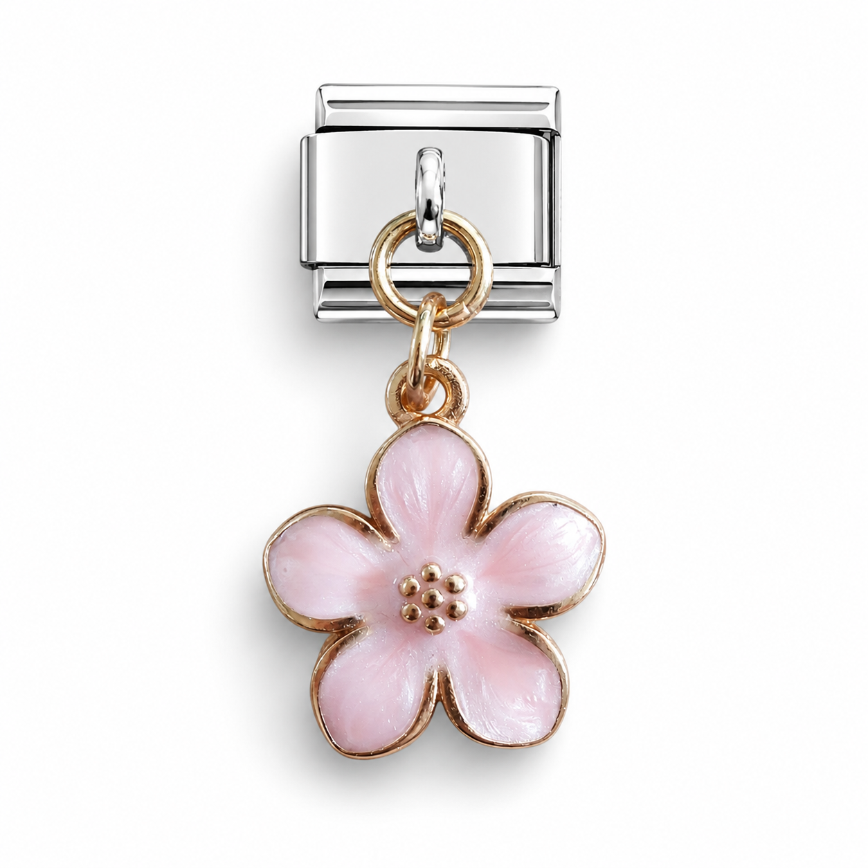 A silver-toned Italian charm link featuring a dangling five-petal flower charm with pink enamel and gold-toned metal borders.