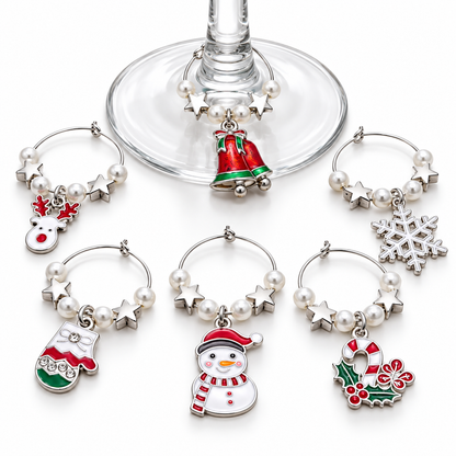 Set of 6 silver wine glass charms featuring pearl beads, stars, snowflakes, and Santa