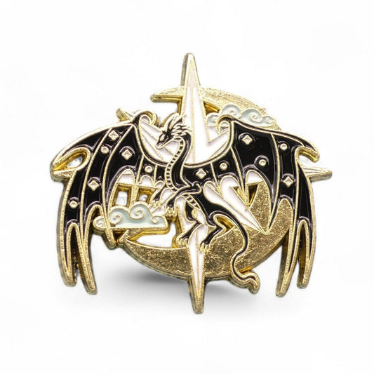 Dragon with wings out in front of a moon and star enamel pin badge 