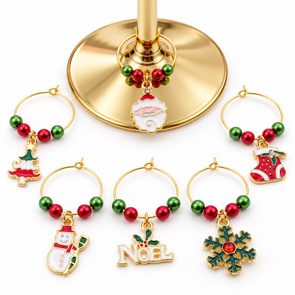 Wine glass charm set of 6 around gold base: Noel sign, stocking, tree, snowman, ornament, snowflake