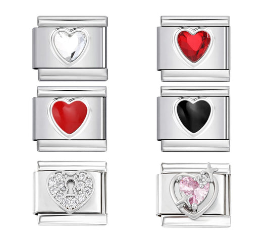 Set of heart-shaped charm links with colored hearts on a white background