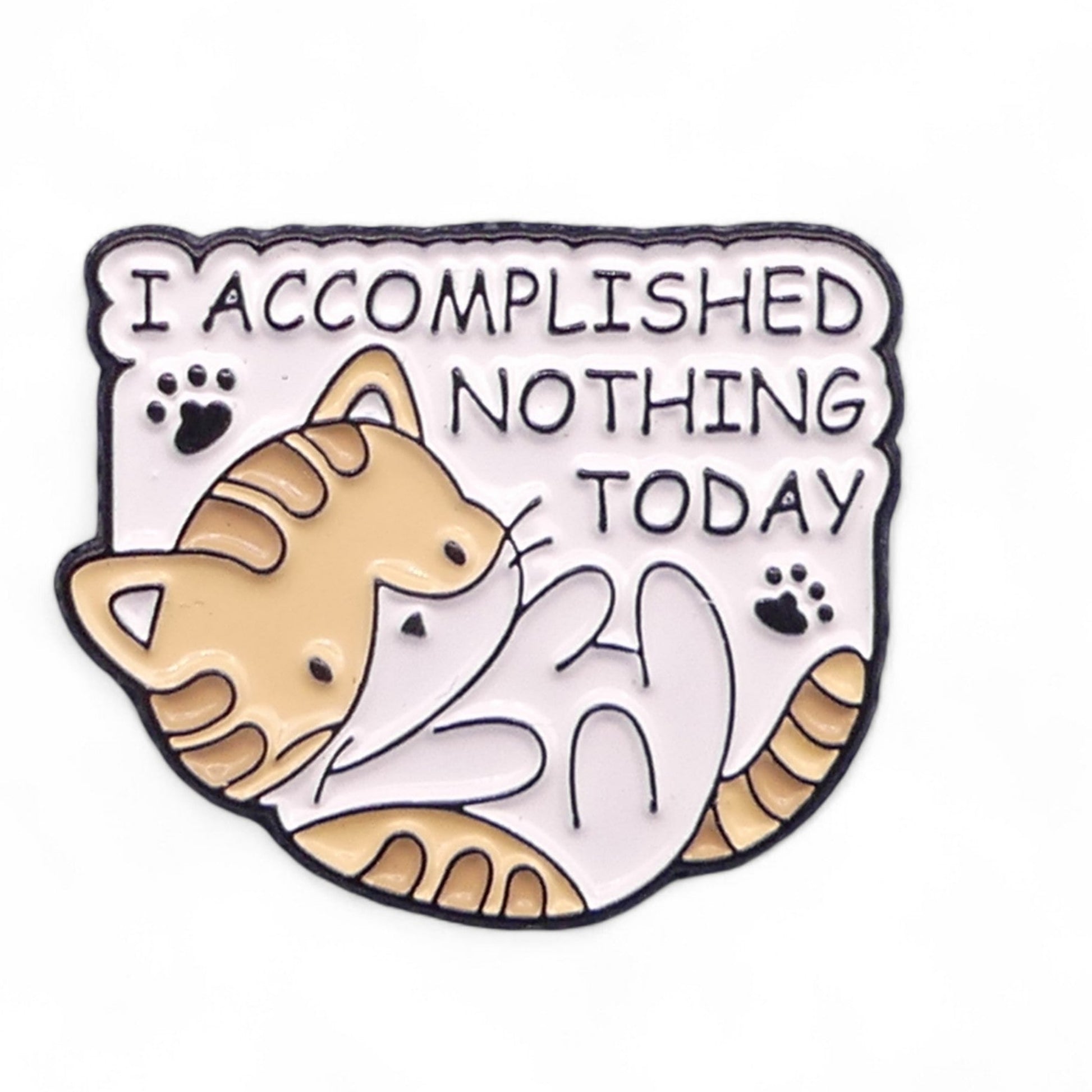 Enamel pin badge featuring a cartoon image of a cat and the text 'I ACCOMPLISHED NOTHING TODAY'.