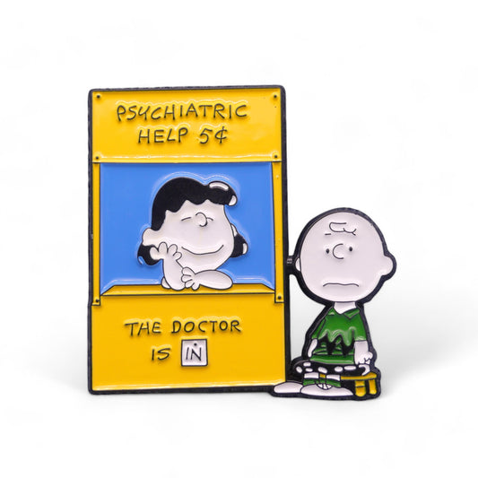 Lucy at her psychiatric help booth with Charlie Brown, colourful enamel pin badge