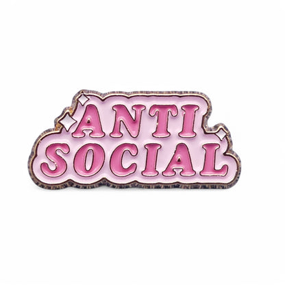 Pink enamel pin with 'ANTI SOCIAL' text 