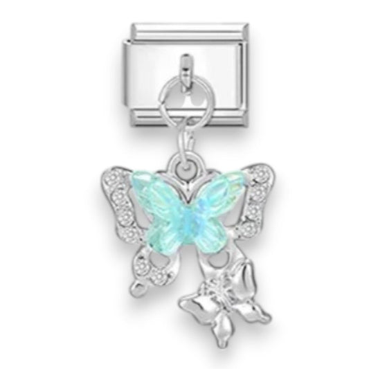 Butterfly dangle charm with light blue butterfly and small angel figure on link