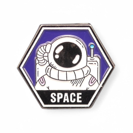 Hexagonal enamel pin with an astronaut design and 'SPACE' text 